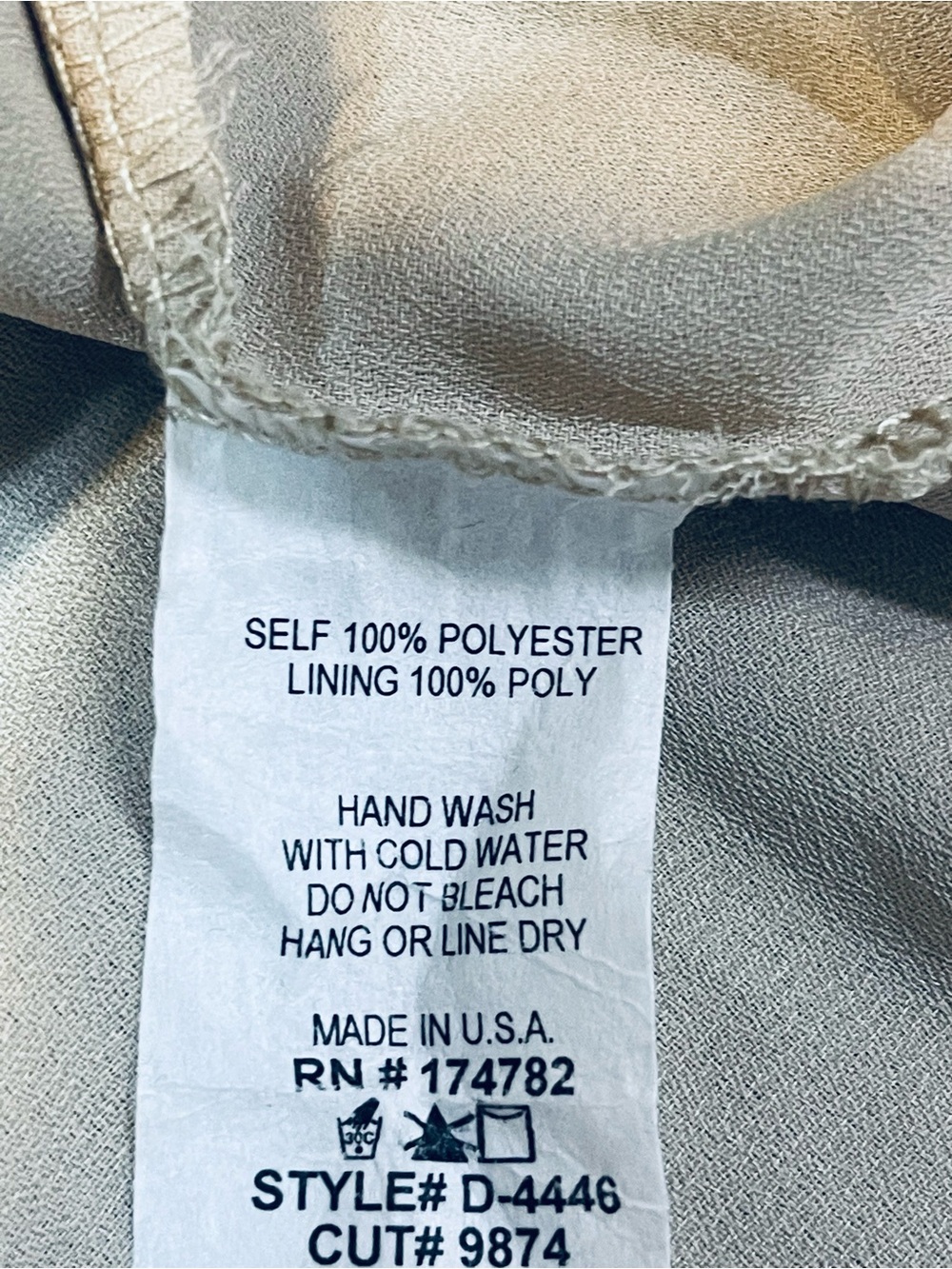 Tyche Cream Labelled Garment with Metallic Trim - Picture 3 of 5